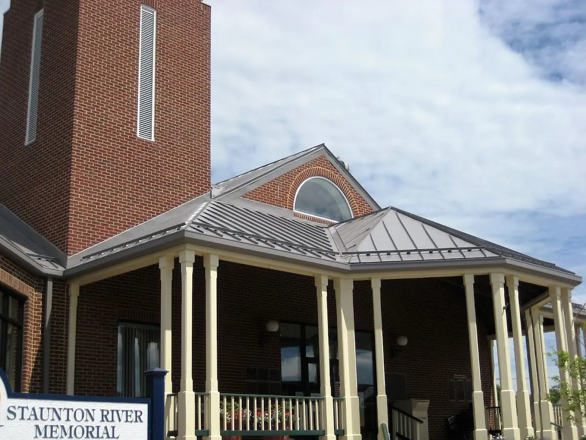 Skilled roofing craftsmen working on a residential roof in Rapid Valley